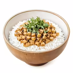 a wooden bowl filled with rice and some tofu