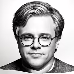a black and white portrait of a man in glasses