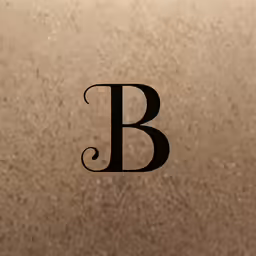 the letter b with swirly, black and tan writing