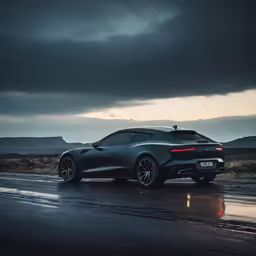 the jaguar car is driving down the road