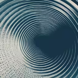 a circular design with dots and holes on the side