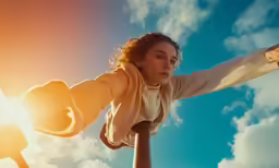 woman flying through the air with a kite
