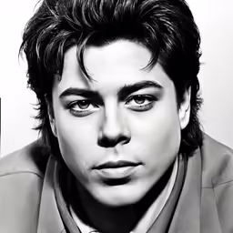 black and white photograph of a young man with a serious look