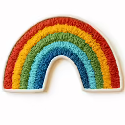 a handmade patch of rainbows on white