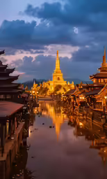 a beautiful view at sunset, including lights reflecting in the water