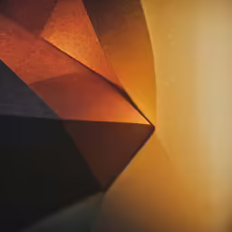 a background photograph of multi colored shapes in orange and yellow