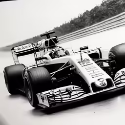 ayromi sitting in a race car and another man standing next to it