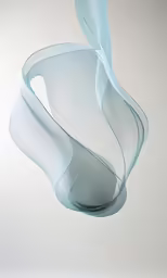 a white, abstract photo of the back of a vase