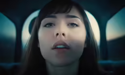 a woman is making a nose turn to the side