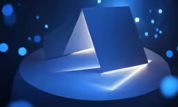 blue illuminated shapes displayed on a black surface