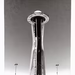 the space needle and convention center at night