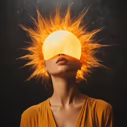 woman wearing a yellow dress, with sun coming out of her forehead