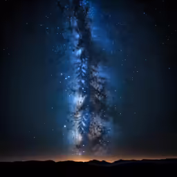 a long narrow galaxy in the night sky