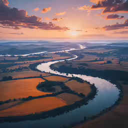 an aerial shot of a river and valley