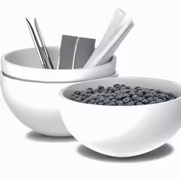 three bowls with different types of utensils in them