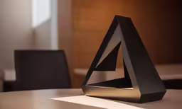 an unusual design sits atop a dining room table