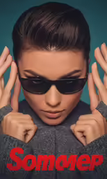 the young woman wears dark sunglasses and has a red advertisement in front of her