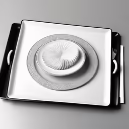 a square plate on top of a black plastic tray