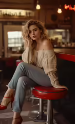 a woman sitting on a stool in a diner