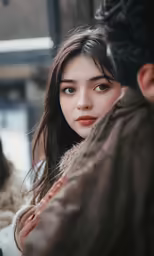 a woman looking at the side of the road