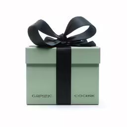 a present wrapped in black ribbon on a white background