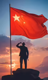 a person is holding up an flag on top of a mountain