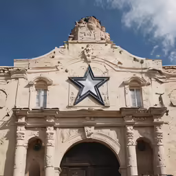 a large star is on top of an old building