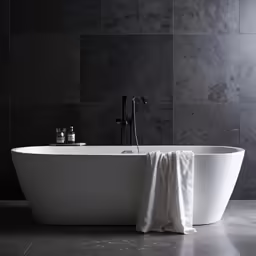 an oval bathtub with a curtain in the middle of it