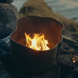 a bowl that has flames inside of it
