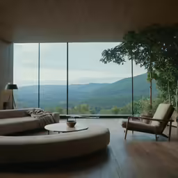 the living room has large windows and a couch