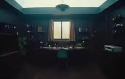 an office with wooden floors and green chairs