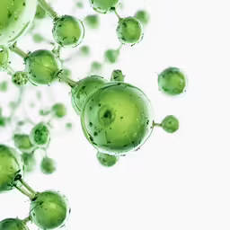 a bunch of green grapes with drops of water on them