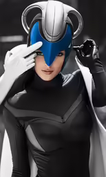 a girl wearing a batman costume with gloves