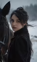 a close up of a young woman with her horse