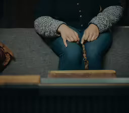 a person that is sitting down on a couch