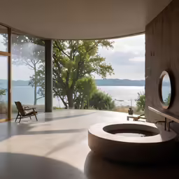 there is an open bathroom with a hot tub near the water