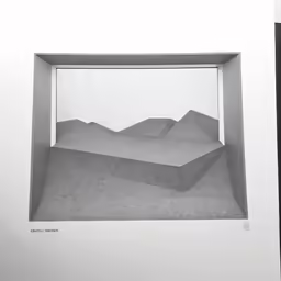 a print with mountains with a frame for writing