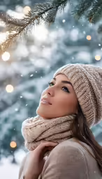 a beautiful woman posing for a photo under a christmas tree
