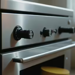 the silver stove door has an automatic timer