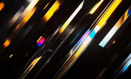 an abstract image with bright lights that are overlapping