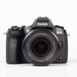 a black camera on top of a white background
