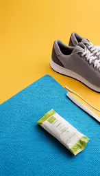 a pair of shoes is shown and a needle