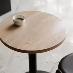 a table that has a cup on it