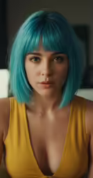 a woman with long, bright blue hair with a yellow tank top