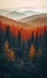 a landscape of mountains and trees, with orange leaves