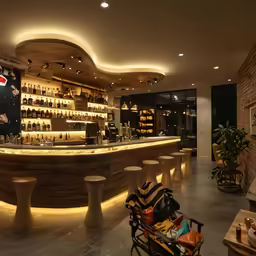 an empty chair is near a bar and shelves of bottles