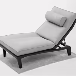 an upholstered chaise lounge chair with a long cushion