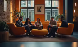 people sitting around the corner of a room