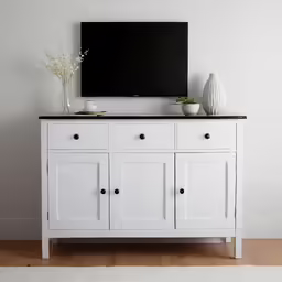 a living room scene with focus on the dresser