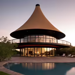 a beautiful house with a pool and a gazebo
